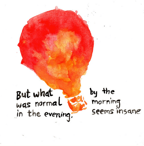 roughly painted lightbulb with the phrase 'But what was normal in the evening, by morning seems insane'