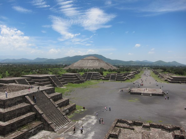 Teotihuacán View from the top of the temple of the moon pyramid at Teotihuacán, along the Avenue of the dead, including the temple of the sun to the left and multiple small structures in the foreground