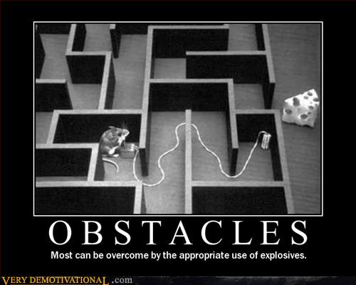 Mouse in a maze with no clear way to the cheese. The mouse has set explosives on the wall closest to the cheese and laid wire back into the maze to where it can safely set the explosives off. Caption reads: Obstacles. Most can be overcome by the appropriate use of explosives.