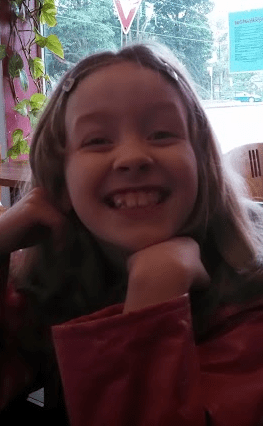 Quinn with massive cheesy grin