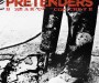 Album cover of The Pretenders' 'Break Up the Concrete'. A photo of someone from the knees down with dirty trousers and shoes directing a road drill into the ground and, well, breaking the concrete.