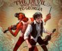 The Devil and Johnny back to back, brandishing their fiddles. The Devil's got a big grin and an elvis curl to his hair. Johnny's got his bow in a strong grip and a knowing smirk on his face.
